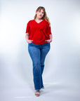 Blusa con scollo a V e manica a giglio