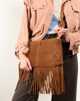 BORSA SCAMOSCIATA A TRACOLLA CON FRANGE E BORCHIE