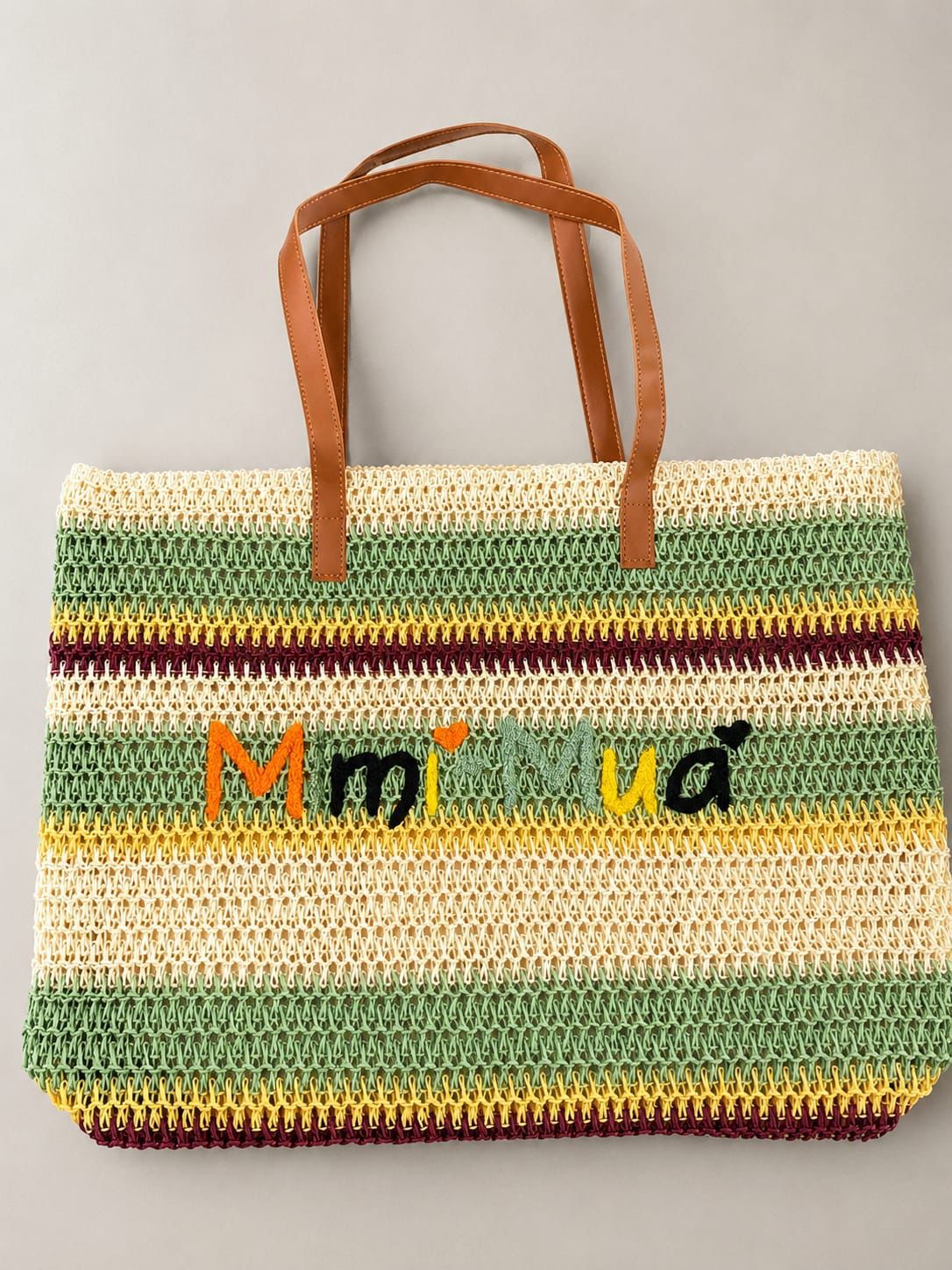Borsa maxi in fantasia con zip e ricamo centrale