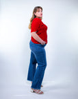 Blusa con scollo a V e manica a giglio