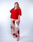 Blusa con scollo a V e manica a giglio
