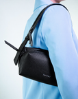 Pochette con tracolla a zip