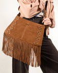 BORSA SCAMOSCIATA A TRACOLLA CON FRANGE E BORCHIE